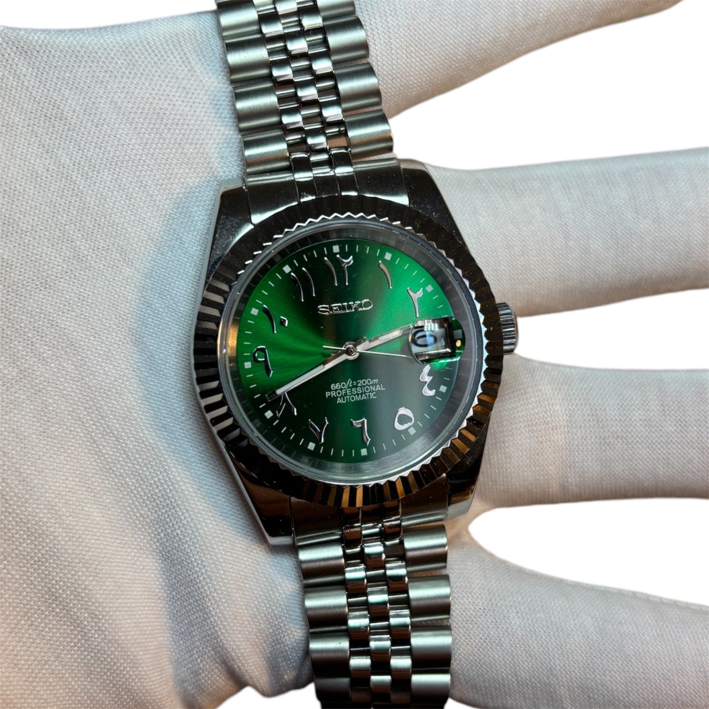 seiko cadran arabic dial vert avec bracelet jubilee 